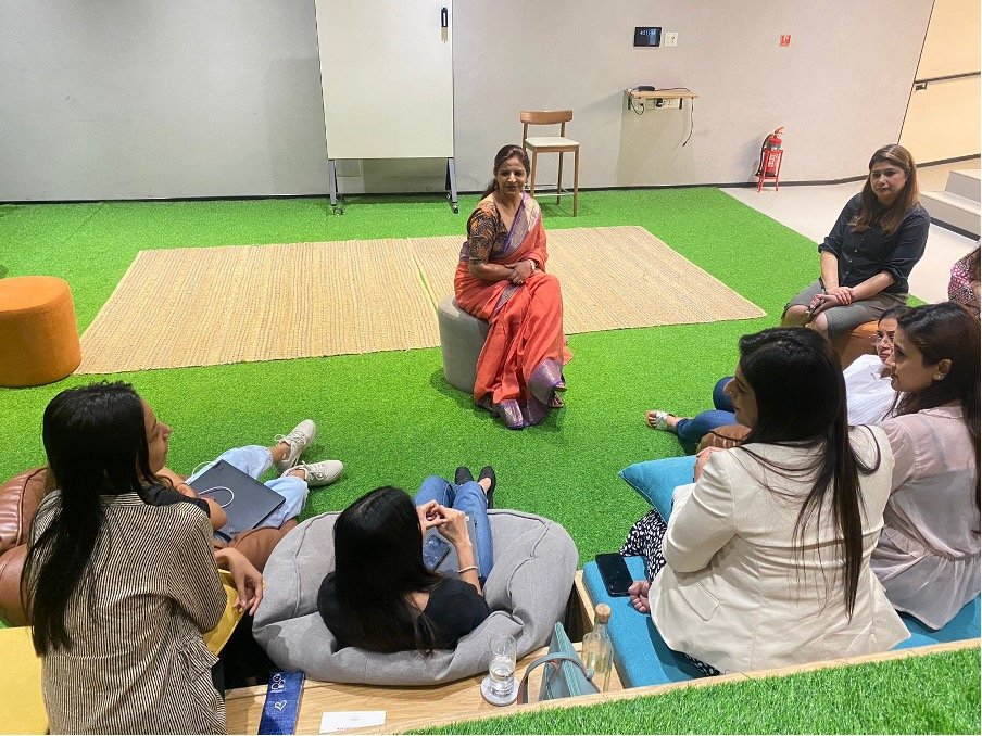 Informal group storytelling and discussion circle during a Voyage Ahead creative workshop
